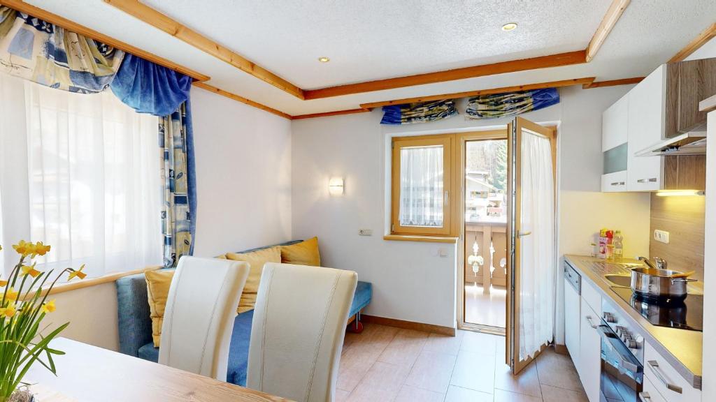 Kuchyň nebo kuchyňský kout v ubytování Appartements Hofer