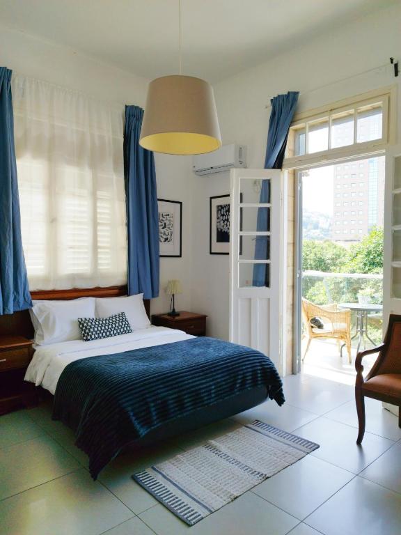 Postel nebo postele na pokoji v ubytování Eden Hotel