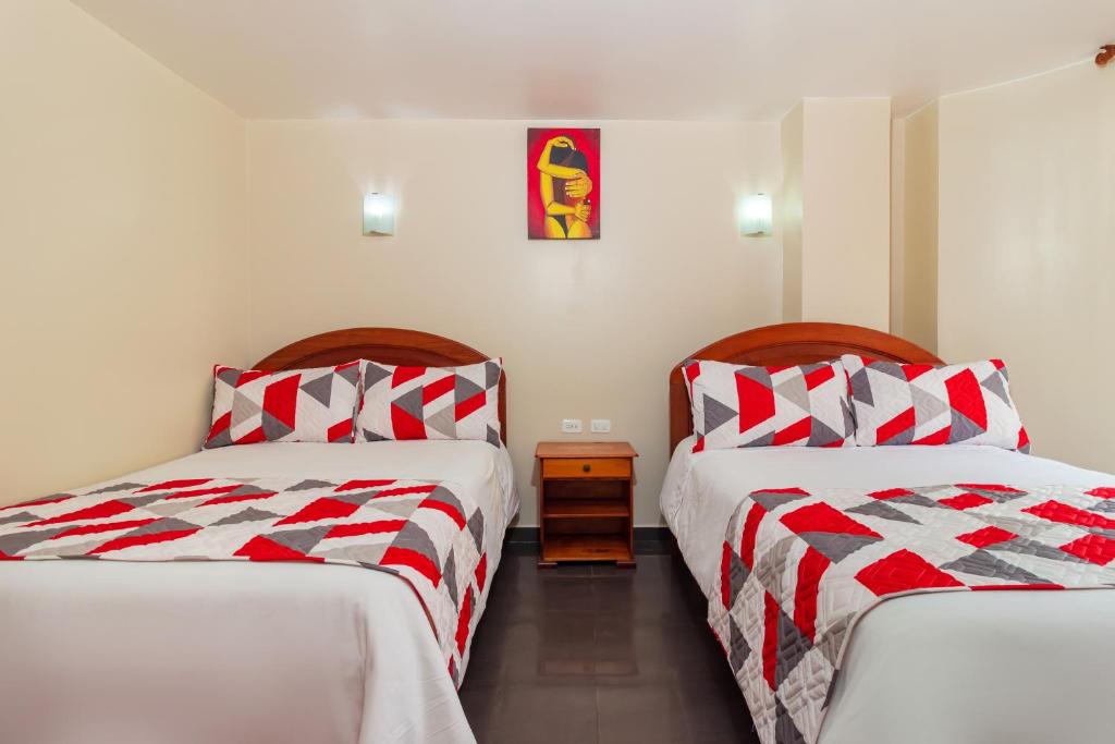 Postel nebo postele na pokoji v ubytování Hotel Elvita Spa