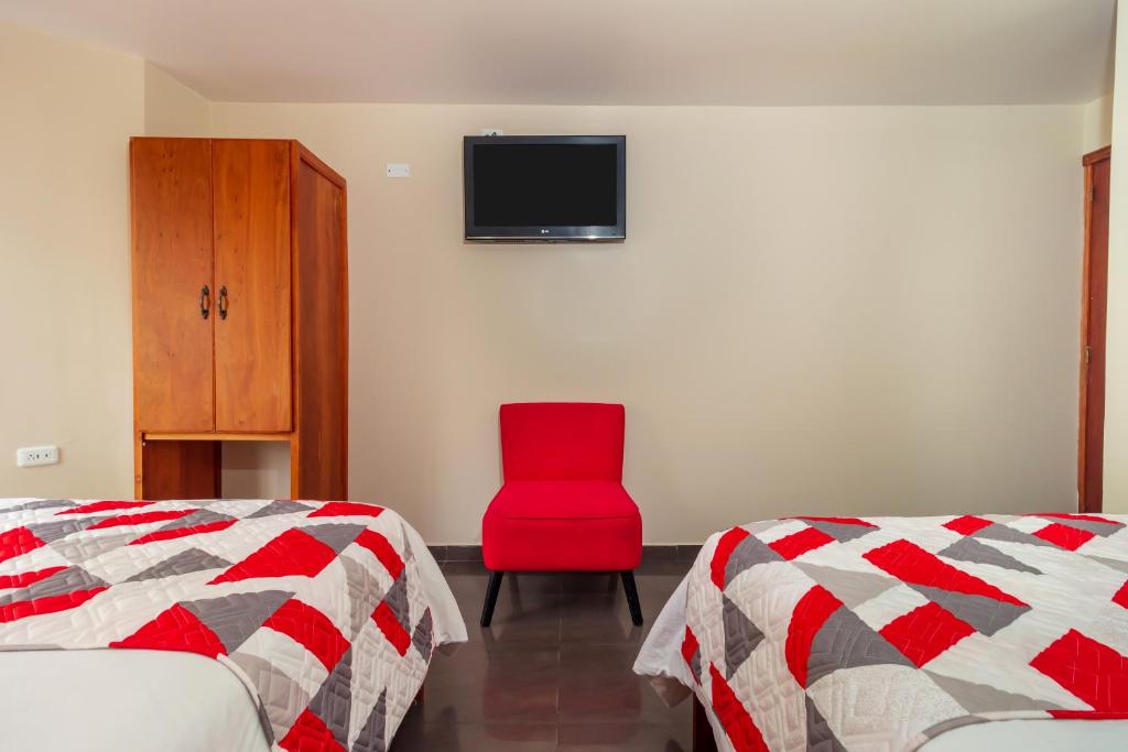 Postel nebo postele na pokoji v ubytování Hotel Elvita Spa