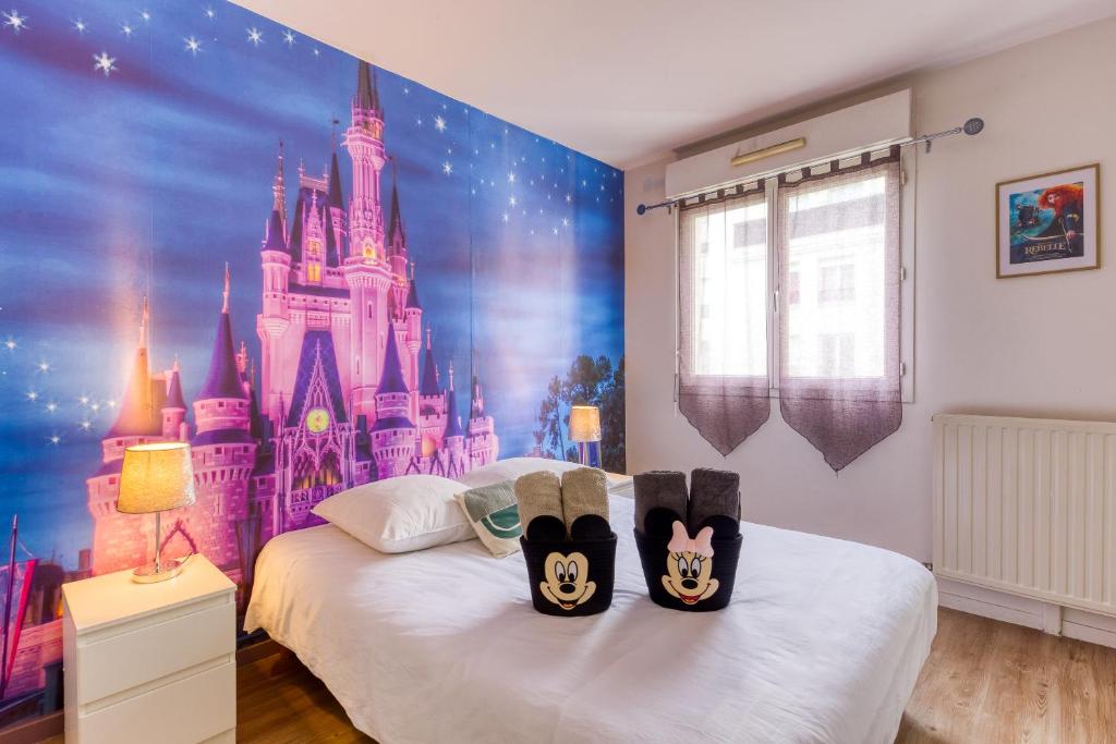 Posteľ alebo postele v izbe v ubytovaní Cosy home / Disney / jungle