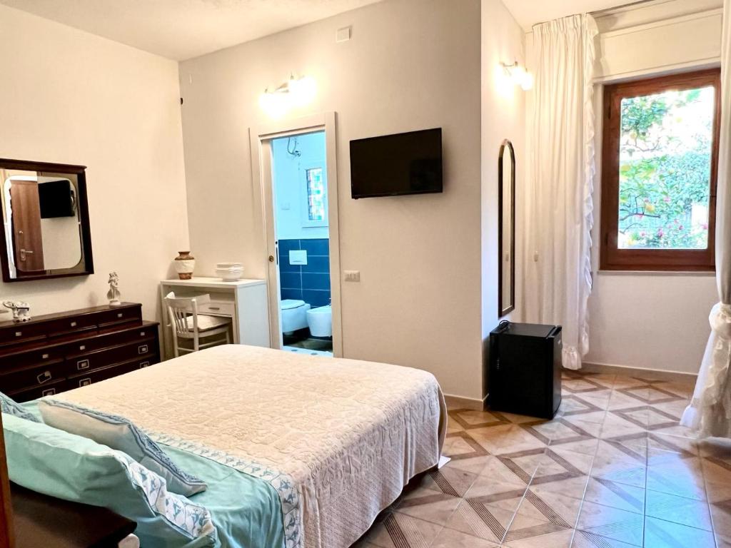Postel nebo postele na pokoji v ubytování Casa Giada