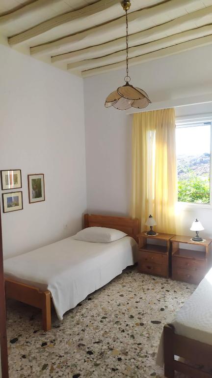 A bed or beds in a room at Almond trees house