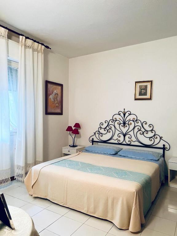Postel nebo postele na pokoji v ubytování Casa Giada