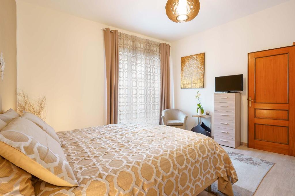 Postel nebo postele na pokoji v ubytování Montellinos Suite Tortora