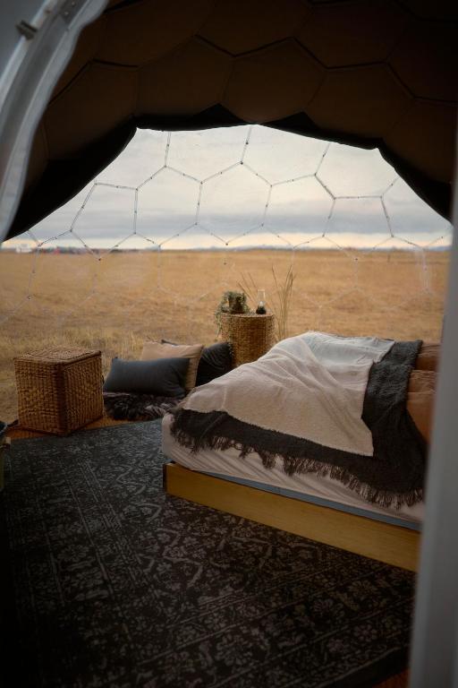 Postel nebo postele na pokoji v ubytování Helja Stay Glamping Domes