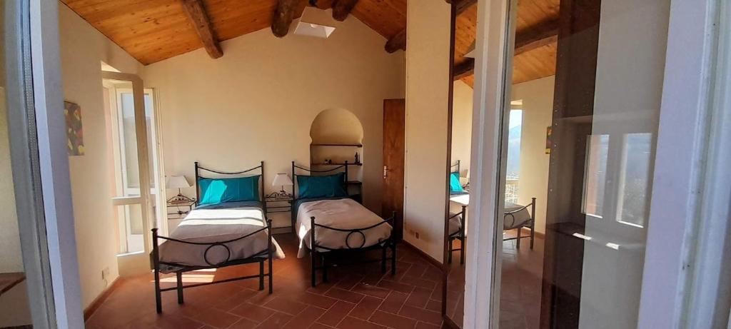 Ένα ή περισσότερα κρεβάτια σε δωμάτιο στο Nostro Paradiso