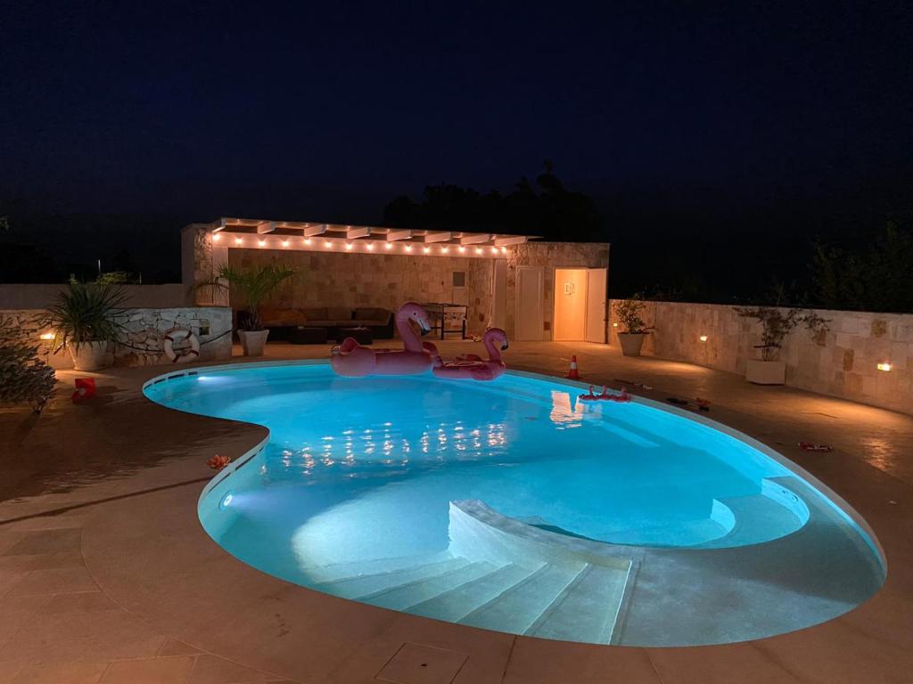 Bazén v ubytování Trulli Clematis with Pool nebo v jeho okolí