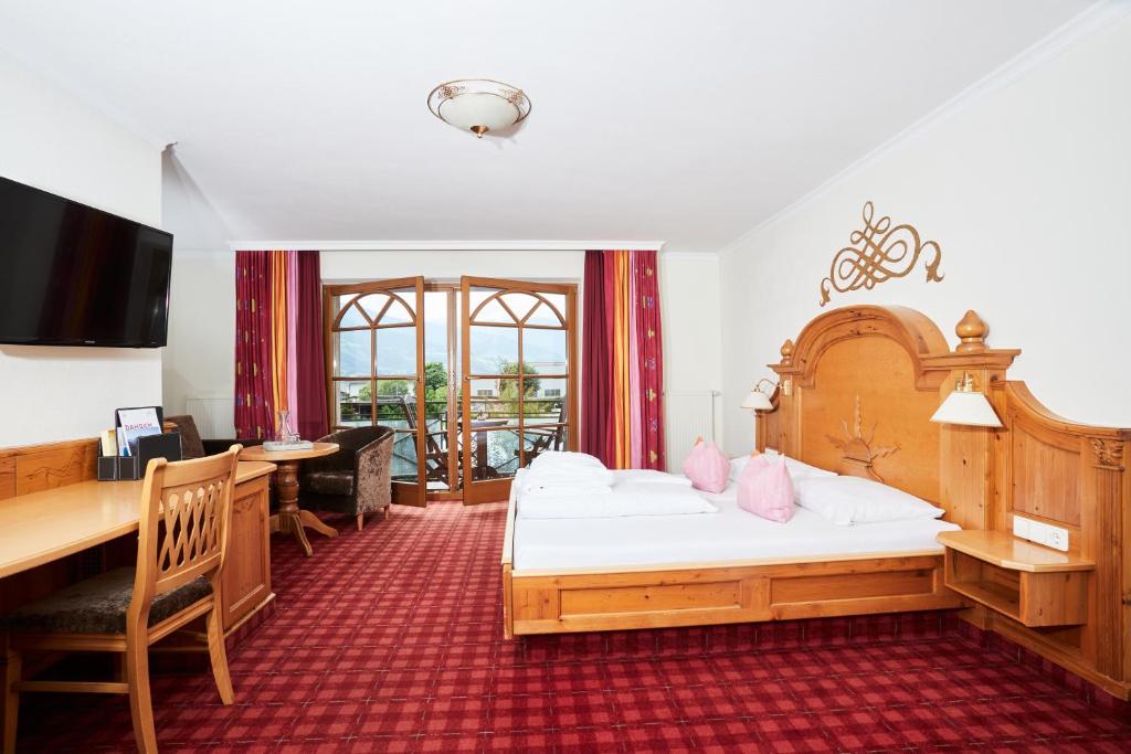Ein Bett oder Betten in einem Zimmer der Unterkunft All In Resort Schwarzbrunn - 4 Sterne Superior