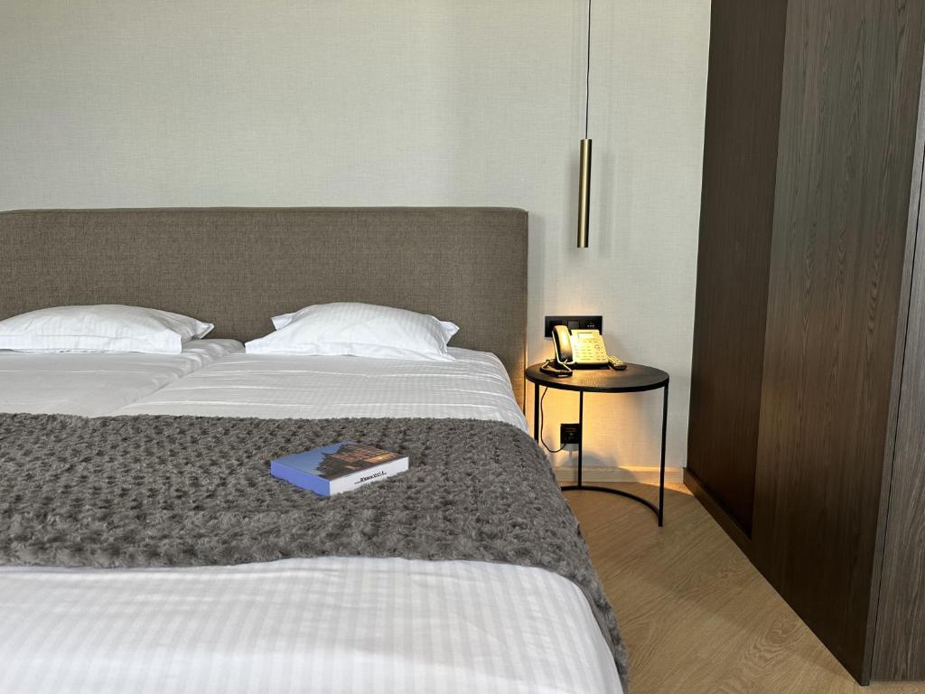 Postel nebo postele na pokoji v ubytování Hotel Villa Select