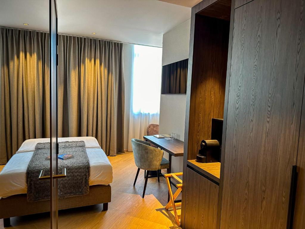 Postel nebo postele na pokoji v ubytování Hotel Villa Select
