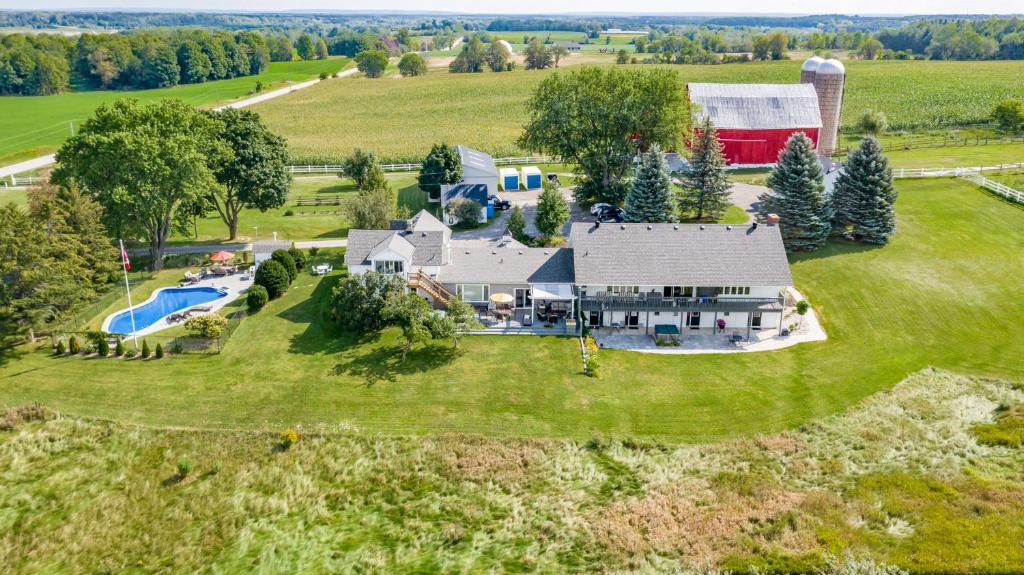 an aerial view of a large estate with a barn at Mountain Ash Farm Country Manor in Creemore