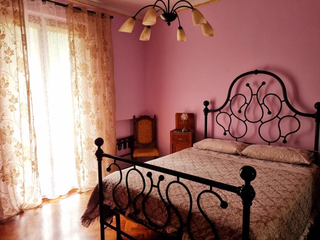 Een bed of bedden in een kamer bij San Francesco