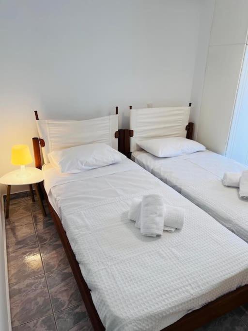 Postel nebo postele na pokoji v ubytování Akrata apartment
