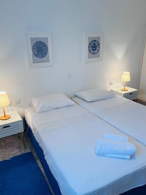 Postel nebo postele na pokoji v ubytování Akrata apartment