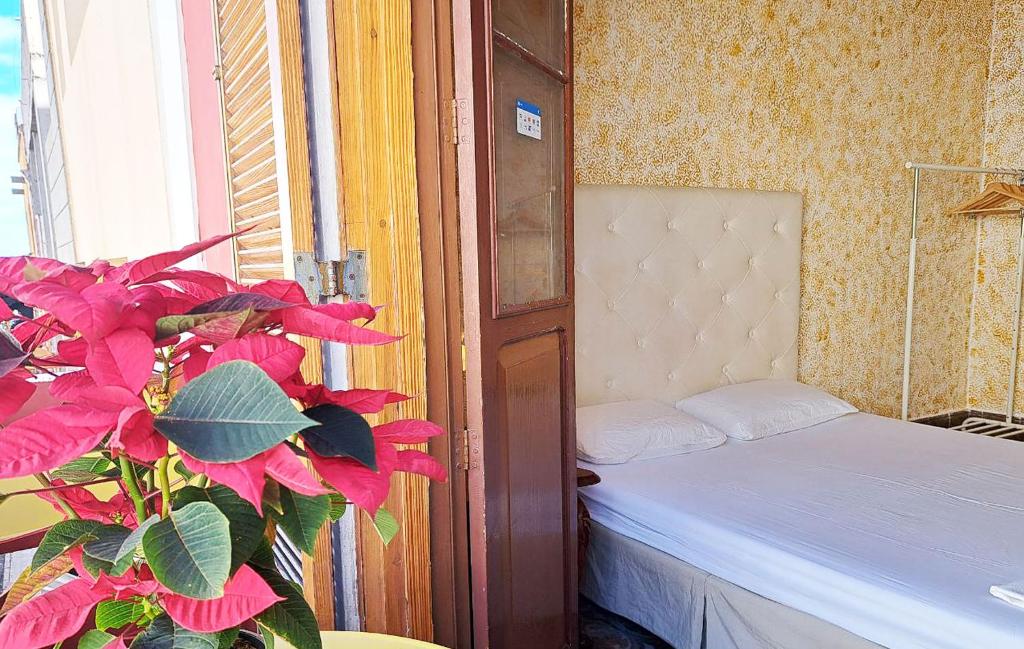 Postel nebo postele na pokoji v ubytování Stardust House Vegueta