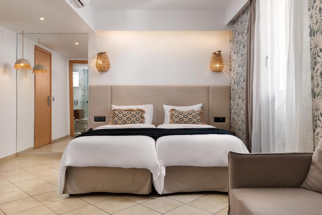 Postel nebo postele na pokoji v ubytování Diana Art Boutique Hotel