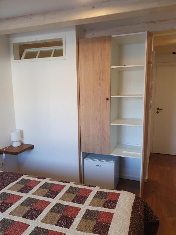 Postel nebo postele na pokoji v ubytování Room CS Cres