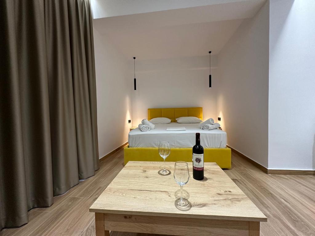 Postel nebo postele na pokoji v ubytování Suites Kozi