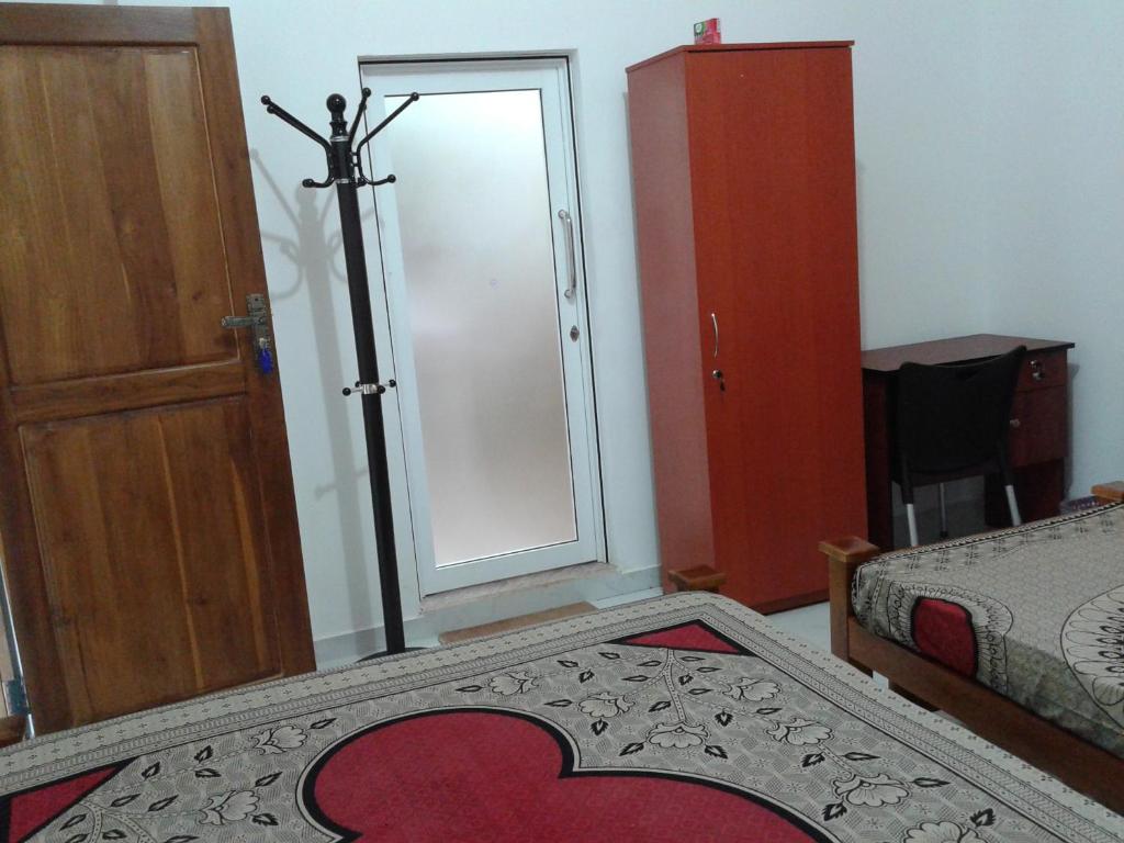 Postel nebo postele na pokoji v ubytování Oudarya Guest