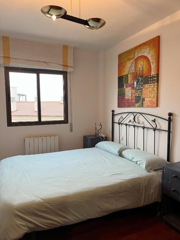 Postel nebo postele na pokoji v ubytování MYM Vivienda Ávila, buena situación. VUT-AV-00805