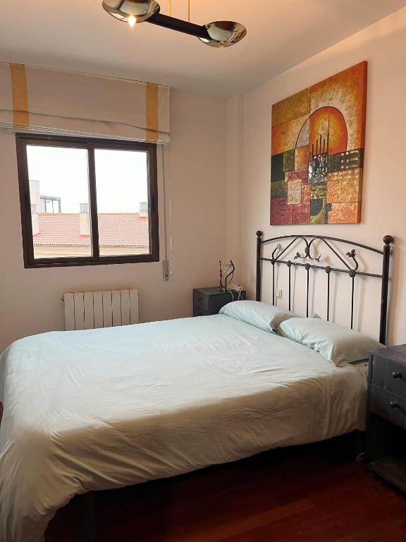 Postel nebo postele na pokoji v ubytování MYM Vivienda Ávila, buena situación. VUT-AV-00805