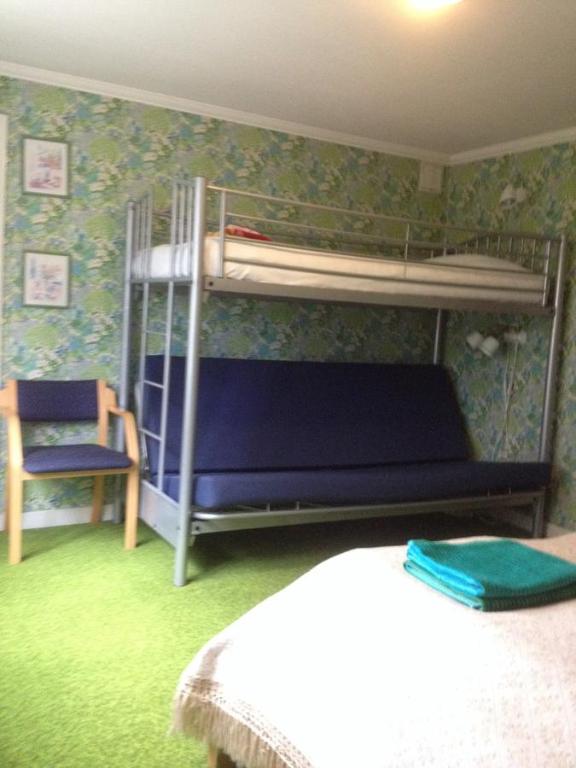 Postel nebo postele na pokoji v ubytování Marielund Gård