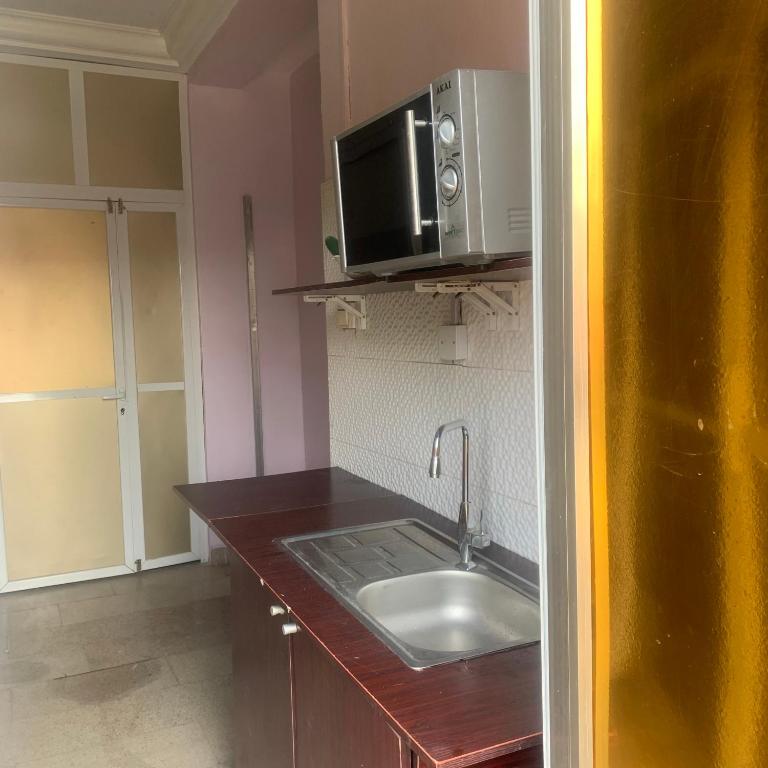 Kuchyň nebo kuchyňský kout v ubytování Health Plaza Abuja
