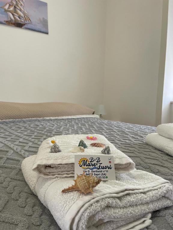 Postel nebo postele na pokoji v ubytování Mare Fuori BedAndBreakfast