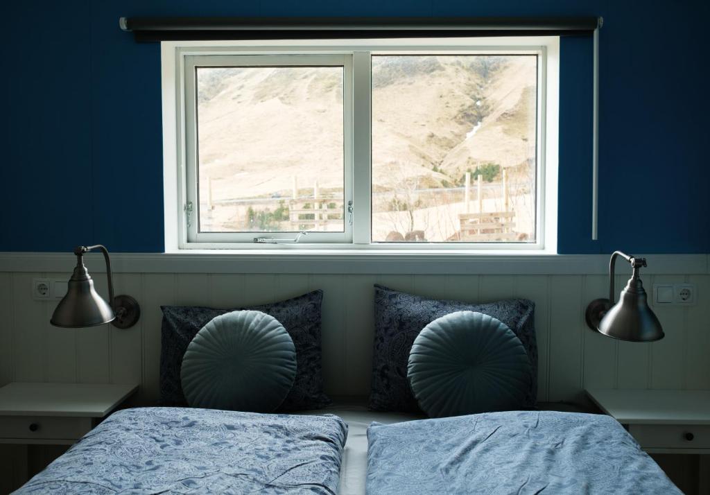 Postel nebo postele na pokoji v ubytování Vík Hostel