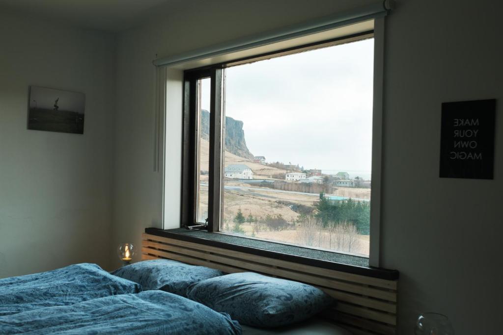 Postel nebo postele na pokoji v ubytování Vík Hostel