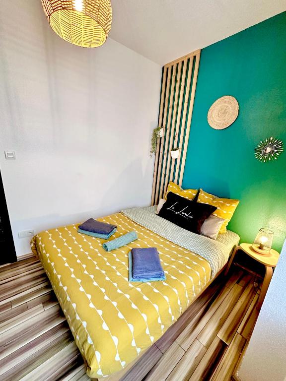 Postel nebo postele na pokoji v ubytování Gîte Lorelei Obernai Centre Ville 2 à 4 personnes