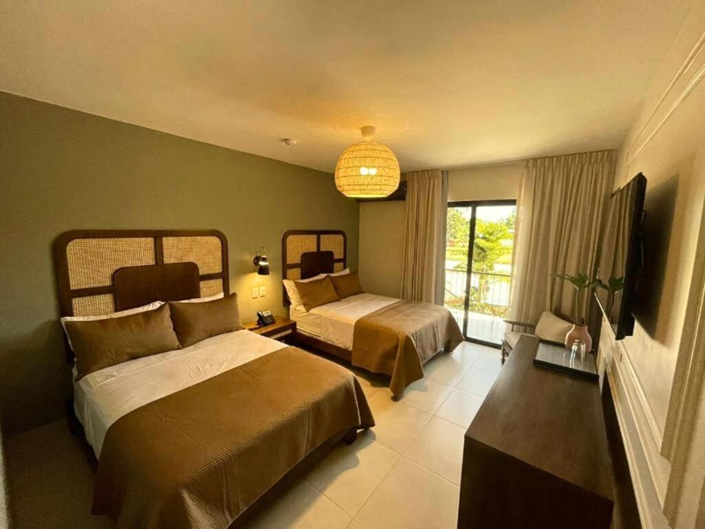 Postel nebo postele na pokoji v ubytování Hotel Pinar Dorado By Hotel Gran Jimenoa