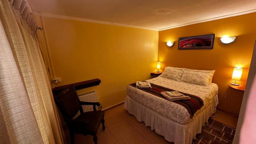 Postel nebo postele na pokoji v ubytování Hostal Solor