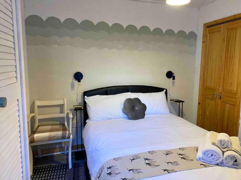 Posteľ alebo postele v izbe v ubytovaní The Old Stables Cosy Cottage in Dunster Exmoor