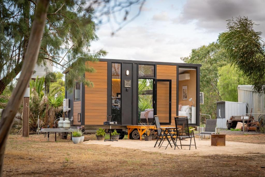 a tiny house is shown in a yard at Banyena Homestead 