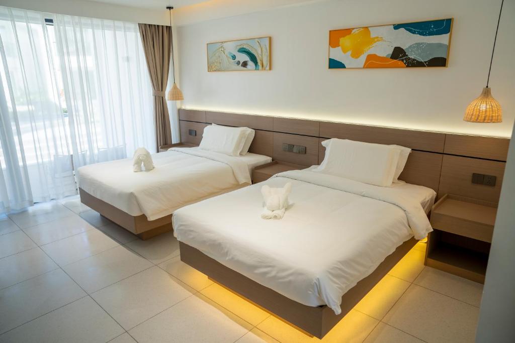 Postel nebo postele na pokoji v ubytování Willander Resort