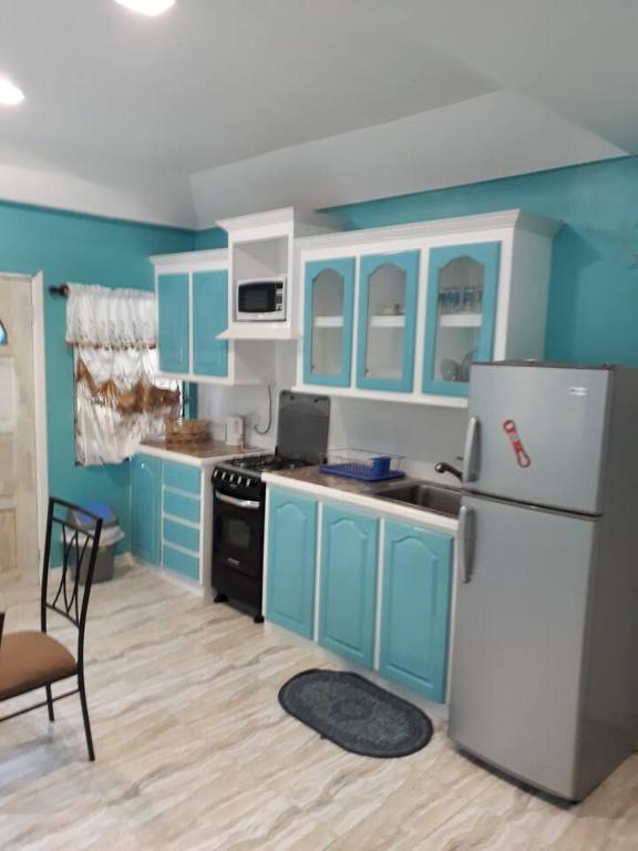 Kuchyň nebo kuchyňský kout v ubytování Argalo Suites 2