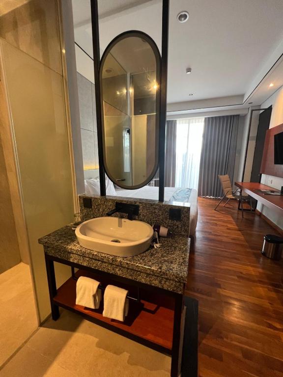 Koupelna v ubytování Grand Miami Hotel