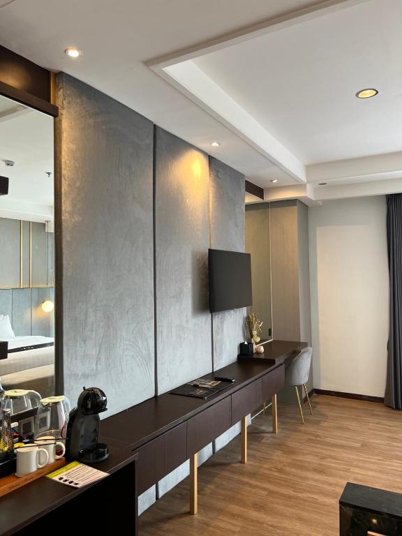 Kuchyň nebo kuchyňský kout v ubytování Grand Miami Hotel