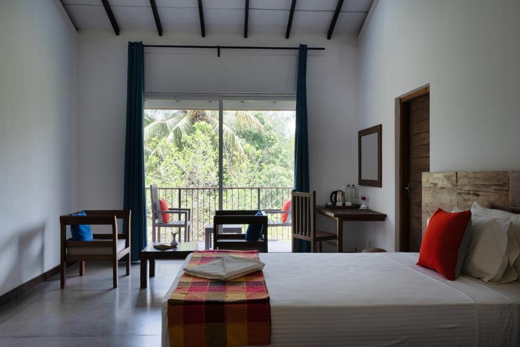 Postel nebo postele na pokoji v ubytování Lario Resort Sigiriya