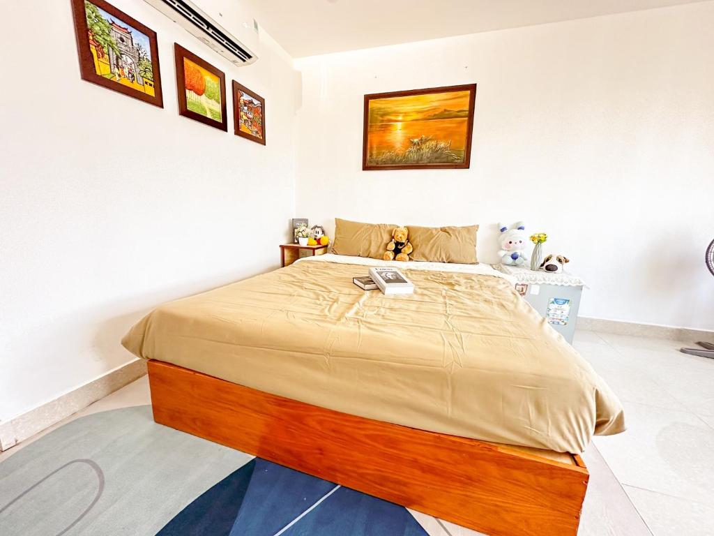 Postel nebo postele na pokoji v ubytování Hồng Châu Hotel