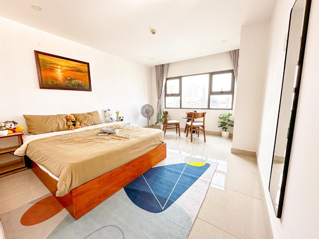 Postel nebo postele na pokoji v ubytování Hồng Châu Hotel