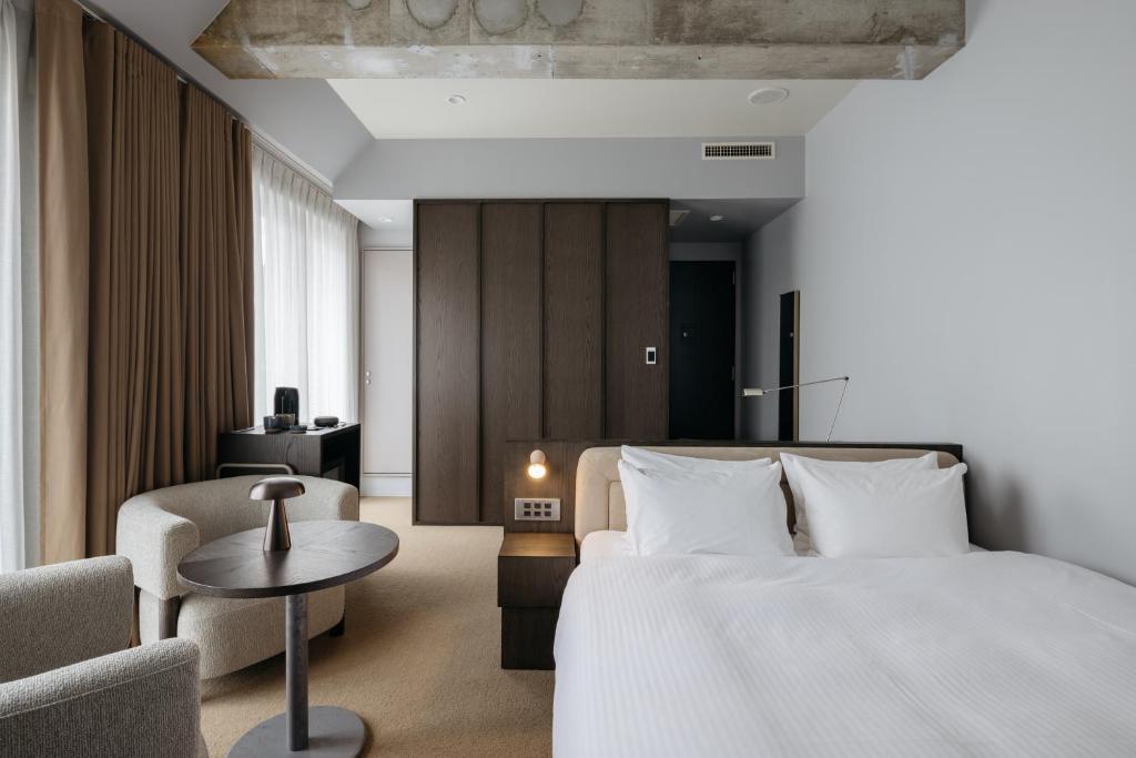 KIRO 広島 by THE SHARE HOTELS にあるベッド