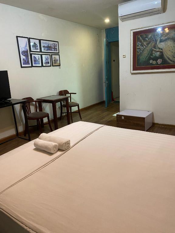 Postel nebo postele na pokoji v ubytování Hanoi Eastern Gate Hostel & Spa