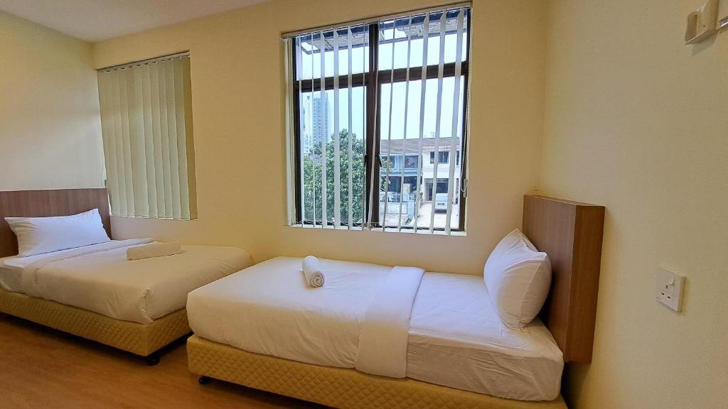 Postel nebo postele na pokoji v ubytování SCC HOTEL PJ
