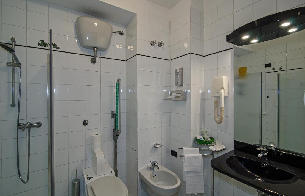 Koupelna v ubytování Hotel Rex