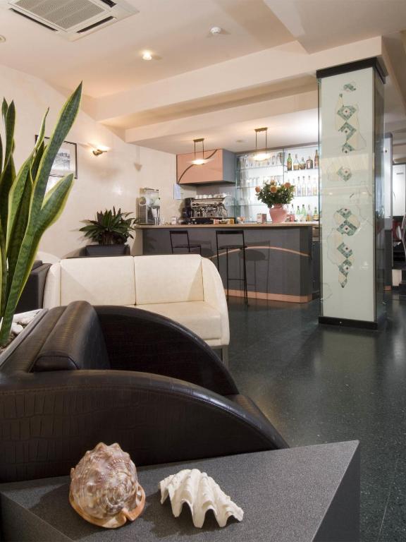 Kuchyň nebo kuchyňský kout v ubytování Hotel Alba