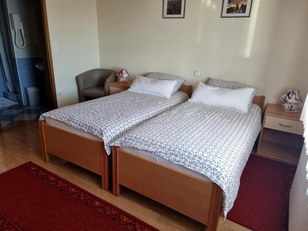 Postel nebo postele na pokoji v ubytování Bed and Breakfast Valjavec