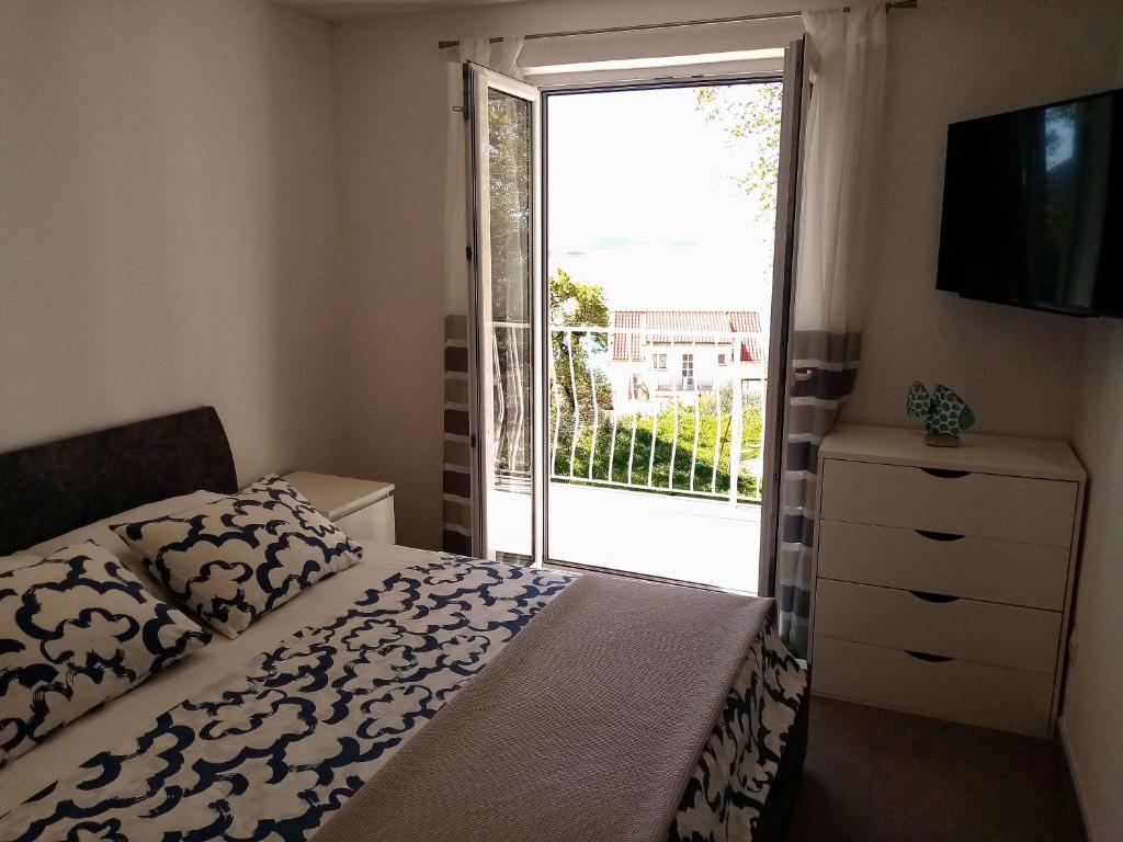 Posteľ alebo postele v izbe v ubytovaní Studio apartman Iva